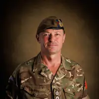 A portrait of an officer in uniform.