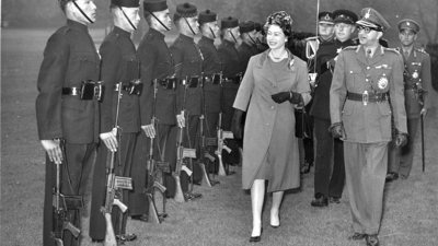 Her Majesty The Queen accompanied by King Mahendra reviews Brigade of Gurkhas at Buckingham Palace, 19 October 1960