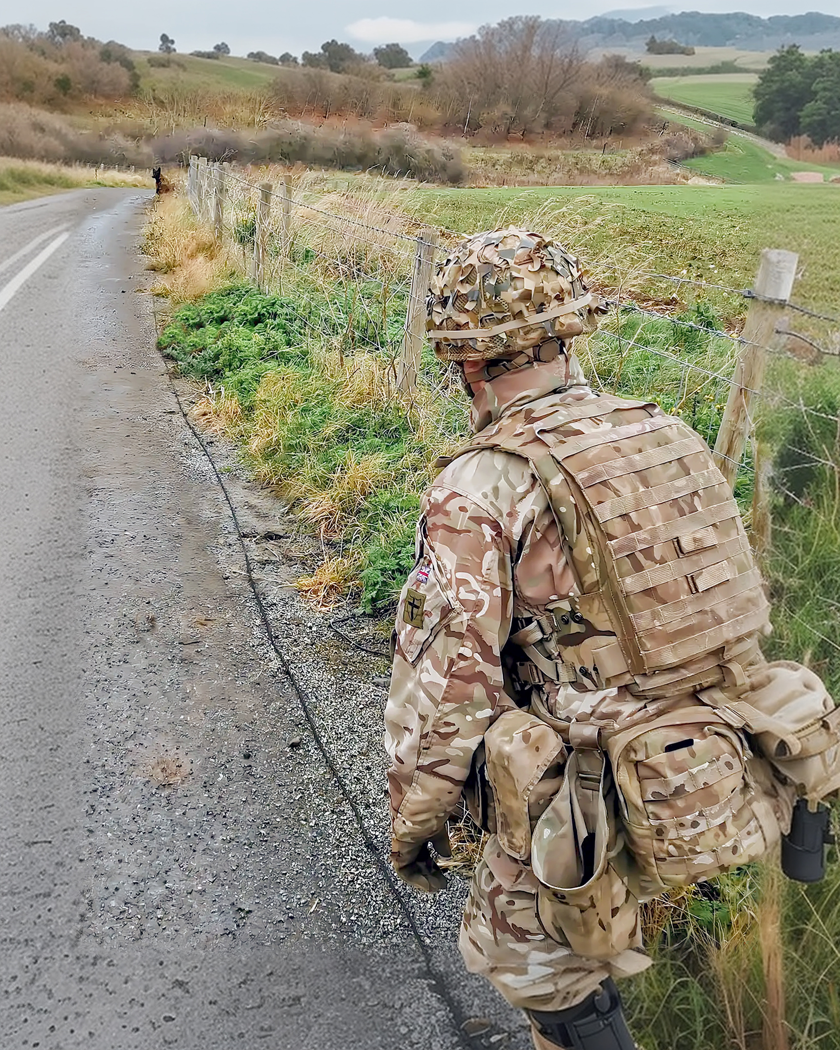 A high assurance search MWD is conducting a roadside search for an IED, it is on a 30meter line and has sat indicating that it has found something. The MWD will be recalled and the handler will indicate the find to the EOD operators.