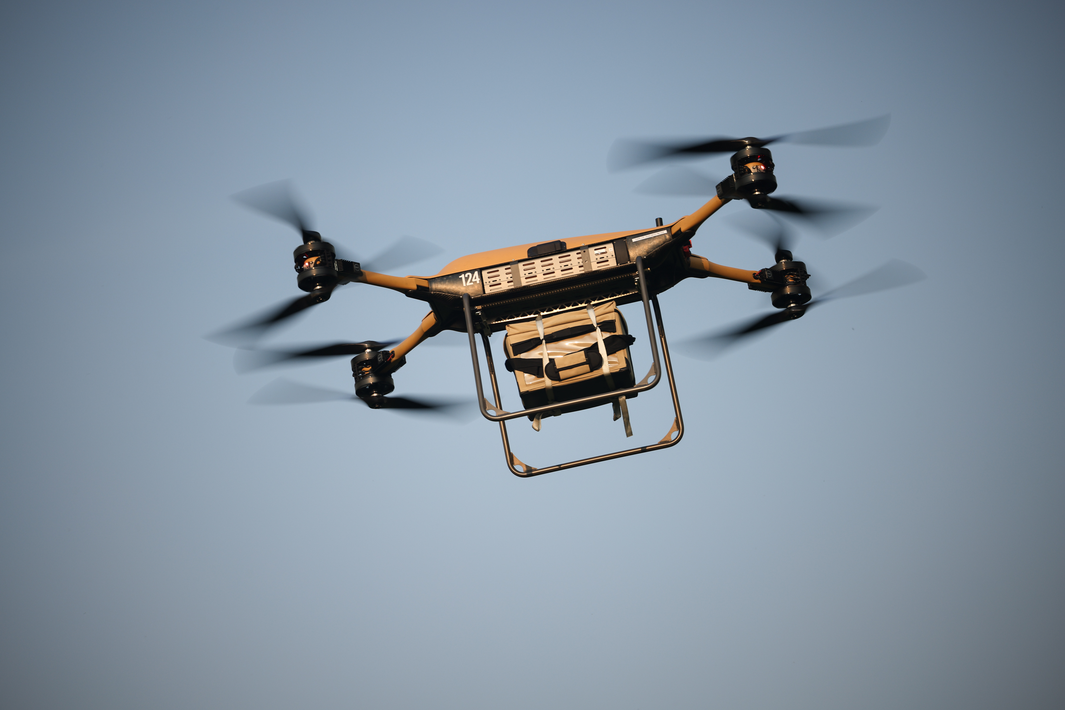 A drone is pictured flying. 