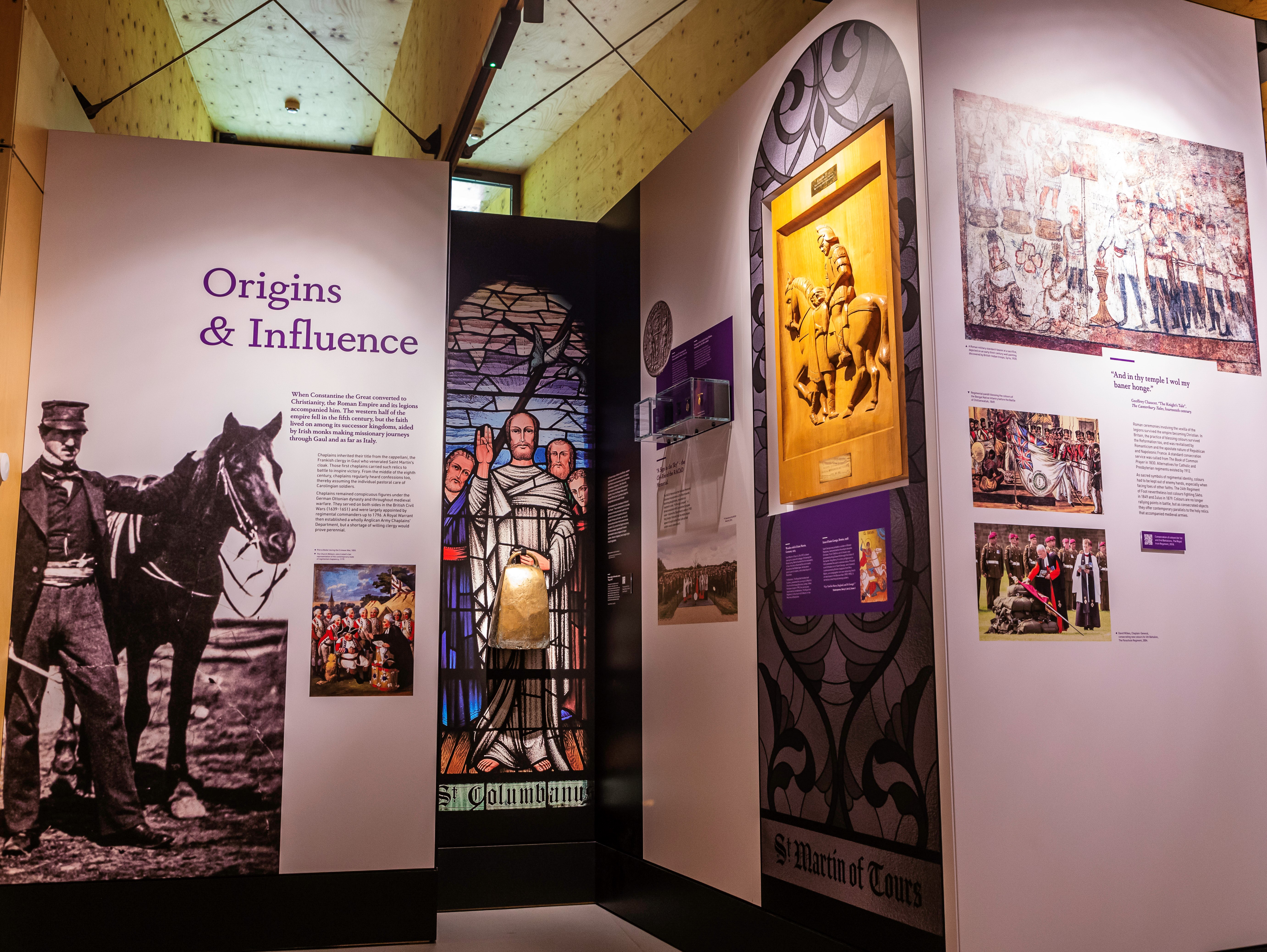 A museum display is pictured, a stained glass window is included. 