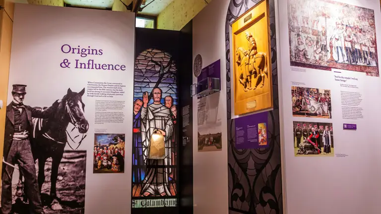 A museum display is pictured, a stained glass window is included.