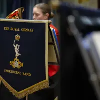 Close-up of a blue music stand banner with