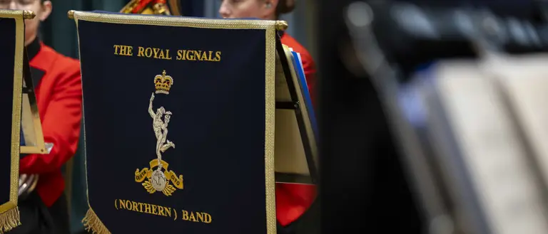 Close-up of a blue music stand banner with